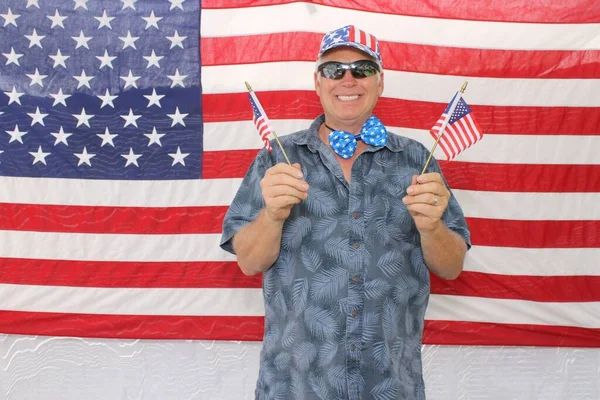 4Th July Photo Booth Party Man Smiles Laughs While Posing — Stock Photo, Image