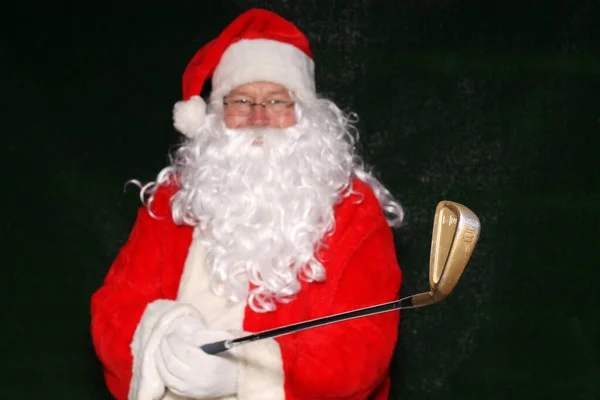 크리스마스 클로스 산타클로스가 부스에서 산타클로스가 웃겨요 재미있는 클로스는 골프를 산타클로스가 — 스톡 사진