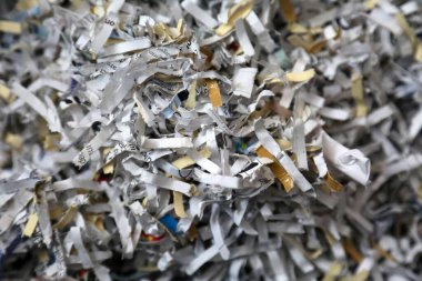 Shredded Sensitive Information. Shredded Secret Documents and information close up.
