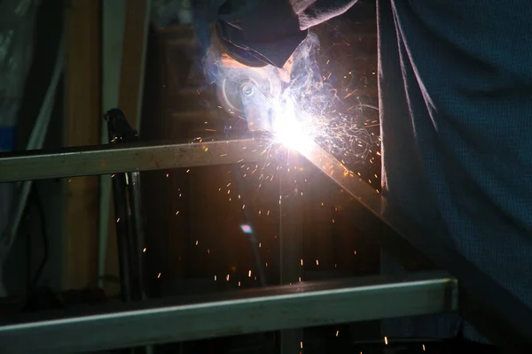 Welding. A welder Arc Welds metal together. Industrial Welding.