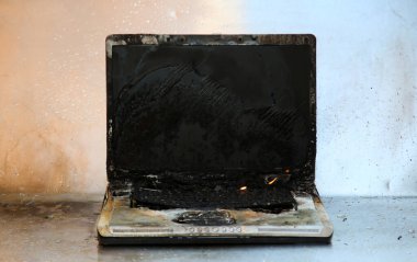 Laptop Computer Damage. Fire and Water Damage of a Laptop Computer. Insurance claim