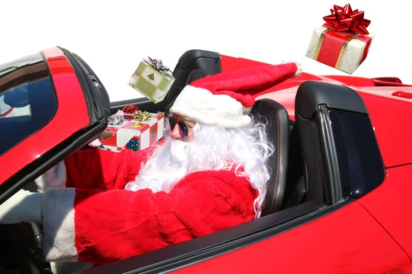 圣诞老人 圣诞老人开着他的红色跑车飞驰而去 Santa Hot Rod车圣诞老人雪橇 圣诞老人开着他的红色热跑车 一边开车一边送圣诞礼物 圣诞老人驾驶着他的火车头跑车送圣诞礼物 — 图库照片