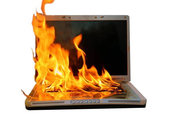 Laptop computer on fire. isolated on white. room for text. Laptop fire damage.