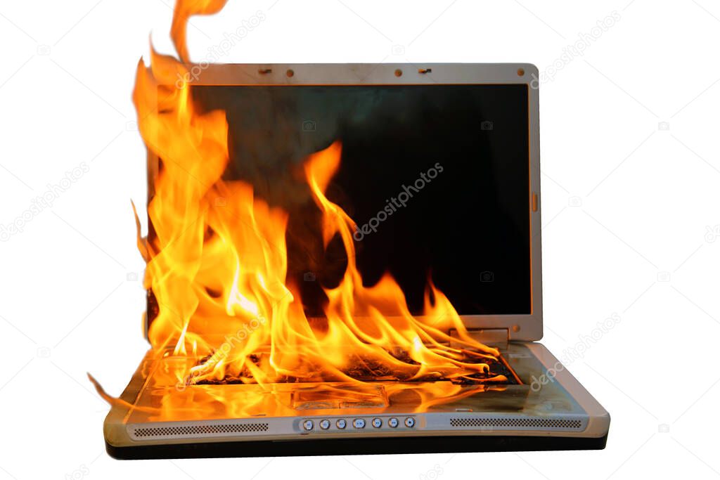 Laptop computer on fire. isolated on white. room for text. Laptop fire damage.