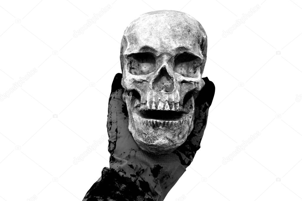 Halloween Skull. Spooky Halloween Skull isolated on black. Covid-19 Halloween Human Skull. A Spooky Monstrous Human Skull Isolated on Black. Coronavirus Human Skull in black. Covid-19. Coronavirus. Death due to Covid-19. Halloween human skull. Evil. 