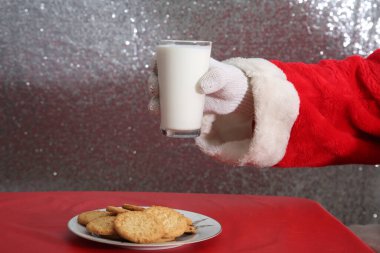 Christmas Cookies. Cookies and Milk. Santa Claus with milk and cookies.
