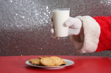 Christmas Cookies. Cookies and Milk. Santa Claus with milk and cookies.