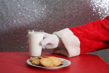 Christmas Cookies. Cookies and Milk. Santa Claus with milk and cookies.