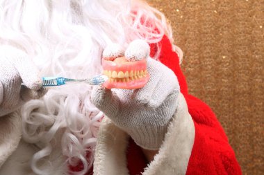 Santa Claus. Santa Claus says You are getting New Dentures for Christmas. Oral Hygiene and Tooth Care. Medical and Health Care.