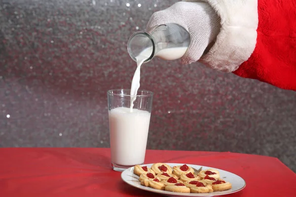Christmas Cookies. Cookies and Milk. Santa Claus with milk and cookies. 