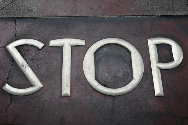 Metal Words Sidewalk Old Metal Words Imbedded Cement Word Stop — Fotografia de Stock