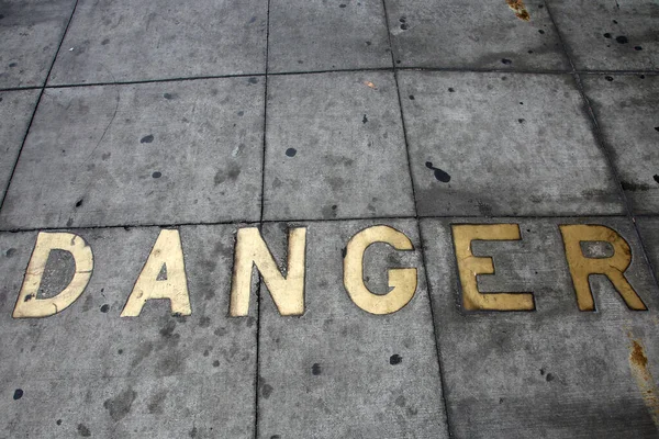 Metal Words Sidewalk Old Metal Words Imbedded Cement Word Danger — Fotografia de Stock