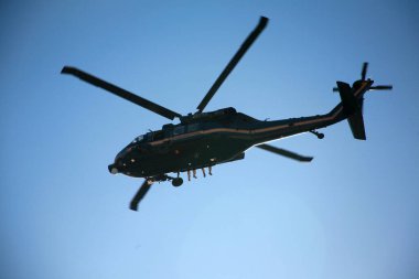 San Yasidro, California - 11/26/2018: Helicopter. Border Patrol Helicopter flies in the air patrolling the US Boarder with Mexico. Migrant Caravan in Mexico threatens to Invade the USA.
