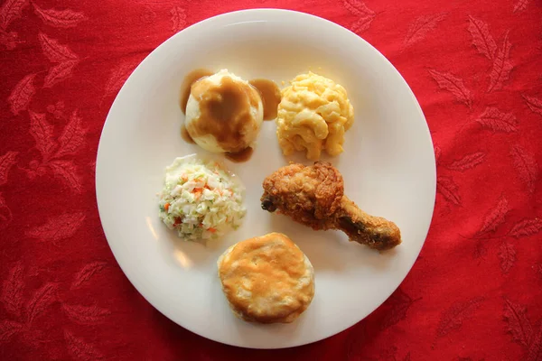 Chicken Dinner Close View Chicken Dinner White Plate Red Table — стоковое фото