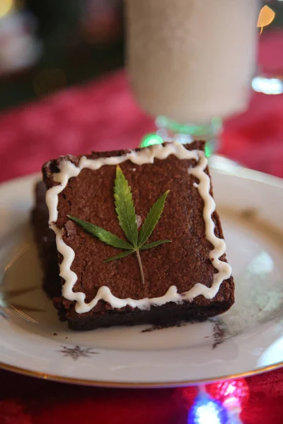 Christmas. Chocolate Brownies Infused with Cannabis. Marijuana leaf. Christmas Gift. Gift for Santa Claus. Genuine Marijuana Chocolate Brownie. medical cannabis brownies. Pot Brownies. edibles. Genuine Marijuana Leaf in the frosting.