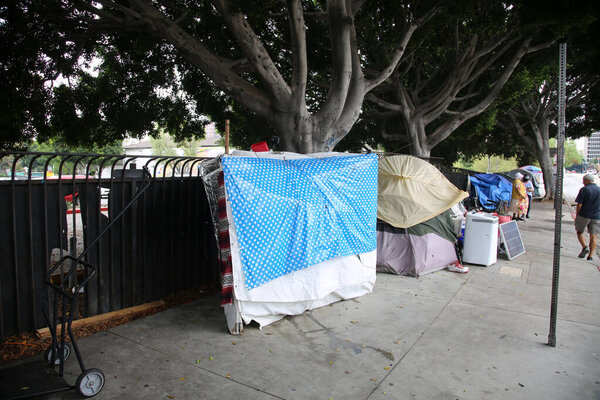 Los Angeles, California. August 17, 2021: Los Angles Homeless Tents and Encampments. Homeless people set up tents on the sidewalks and various locations in Los Angeles to live and sleep. 