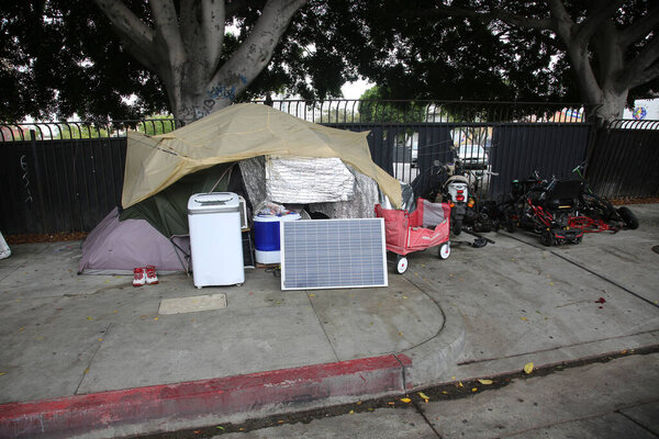Los Angeles, California. August 17, 2021: Los Angles Homeless Tents and Encampments. Homeless people set up tents on the sidewalks and various locations in Los Angeles to live and sleep. 