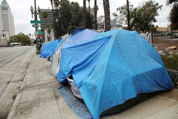 Los Angeles, California. August 17, 2021: Los Angles Homeless Tents and Encampments. Homeless people set up tents on the sidewalks and various locations in Los Angeles to live and sleep. 