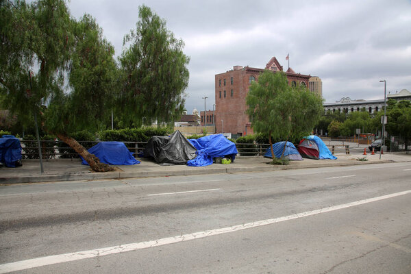 Los Angeles, California. August 17, 2021: Los Angles Homeless Tents and Encampments. Homeless people set up tents on the sidewalks and various locations in Los Angeles to live and sleep. 