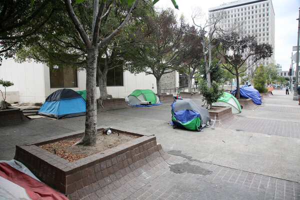 Los Angeles, California. August 17, 2021: Los Angles Homeless Tents and Encampments. Homeless people set up tents on the sidewalks and various locations in Los Angeles to live and sleep. 
