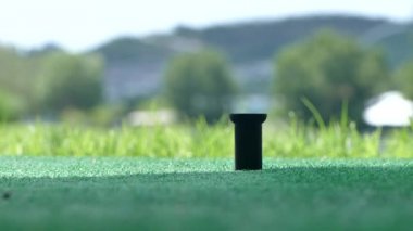Golfçü yapmak Teed Practicing ve eğitim 