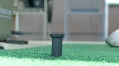 Golfçü yapmak Teed Practicing ve eğitim 