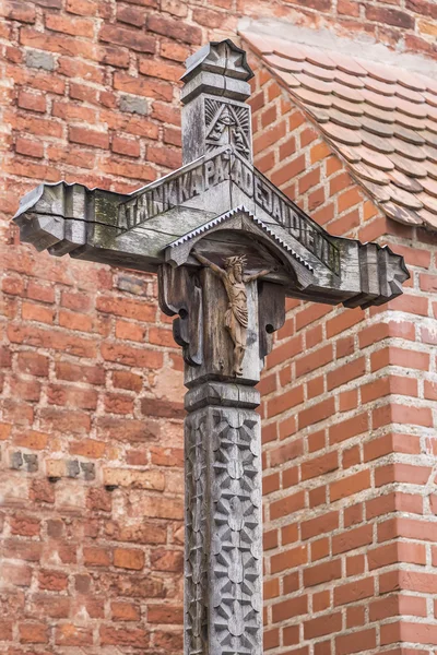 Wooden cross with a crucifix — Stock Photo, Image