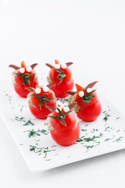 Many small tomatoes stuffed with eggplant baba ganoush — Stock Photo, Image