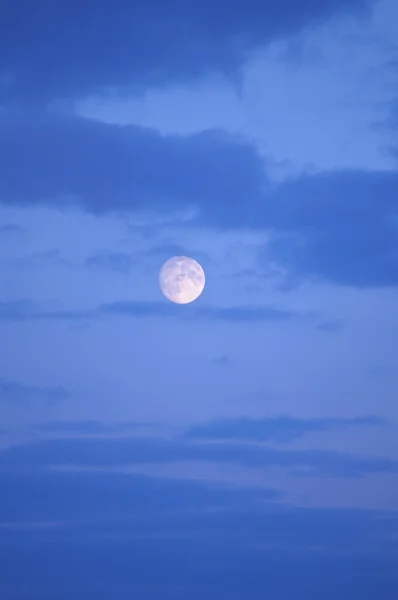 Moon and clouds just after sunset — Stock Photo, Image