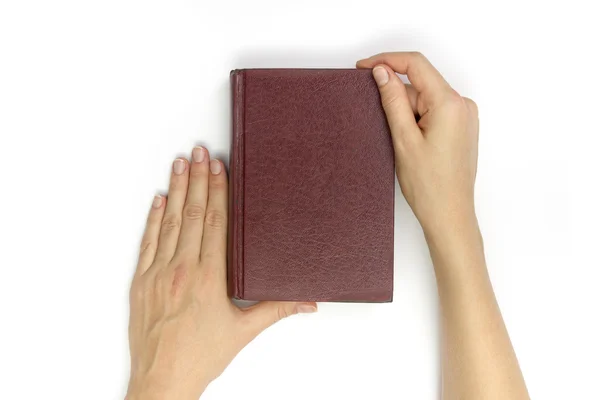 Hands hold blank red hardcover book on white background — Stock Photo, Image