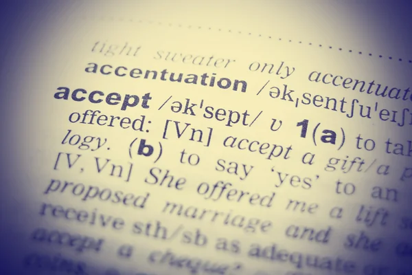 Close up of English dictionary page with word Accept — Stock Photo, Image