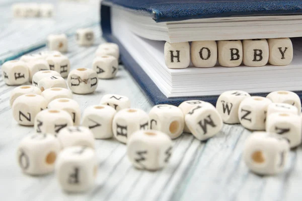 HOBBY palavra escrita em bloco de madeira. ABC de madeira — Fotografia de Stock
