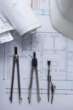 Mimar worplace üstten görünüm. Mimari Proje, planları, blueprint rulo ve bölücü pusula planları. İnşaat arka plan. Mühendislik araçları. Kopya alanı