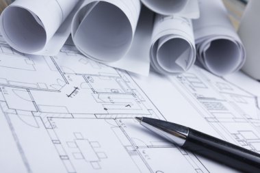 Mimar worplace üstten görünüm. Mimari Proje, planları, blueprint rulo ve kalem planları. İnşaat arka plan. Mühendislik araçları. Kopya alanı