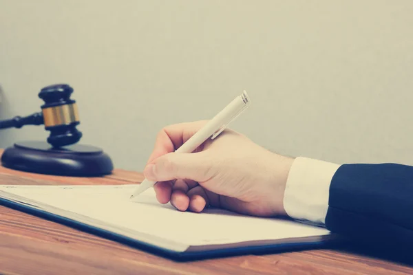 Lawyew working. Notary public signing document at his workplace. — Stock Photo, Image