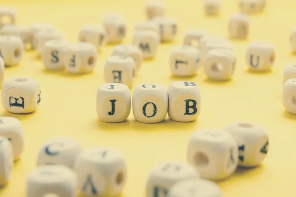 Palabra de trabajo escrita en madera. Abc de madera — Foto de Stock