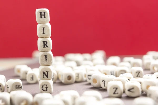 Ahşap blok üzerinde yazılı kelime işe. Ahşap Abc — Stok fotoğraf