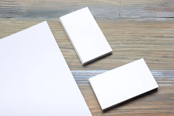 Business card blank over office table. Corporate stationery branding mock-up — Stock Photo, Image