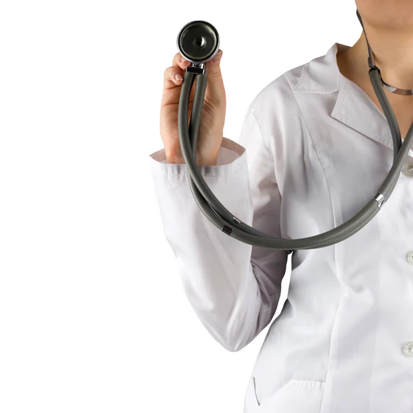 Mão do médico fêmea segurando estetoscópio isolado em fundo branco. Conceito de Saúde e Medicina. Espaço de cópia . — Fotografia de Stock