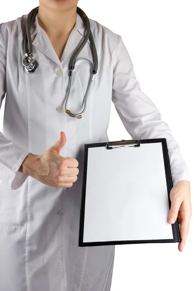 Female doctor's hand holding medical clipboard with blank sheet of paper and stethoscope, giving thumbs up success sign isolated on white background. Concept of Healthcare And Medicine. Copy space. — Φωτογραφία Αρχείου