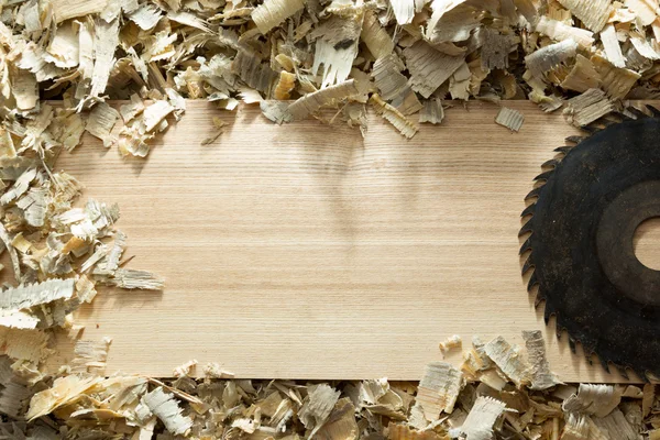 Carpenter tools on wooden table with sawdust. Carpenter workplace top view — Stock Photo, Image