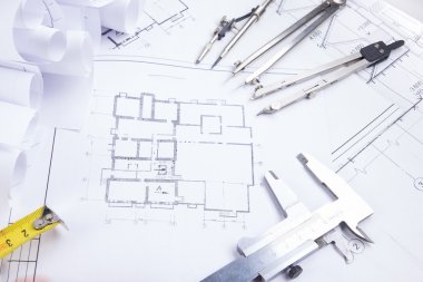 Mimari Proje, planları, blueprint rulo ve bölücü Pusula, planları üstten mühendislik araçları görünüm Çap pergeli. Uzay kopyalayın. İnşaat arka plan.