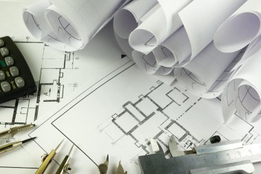 Mimari Proje, taslakları, blueprint rulo planları. Mühendislik araçları en baştan görüntüleyin. Uzay kopyalayın. İnşaat arka plan.