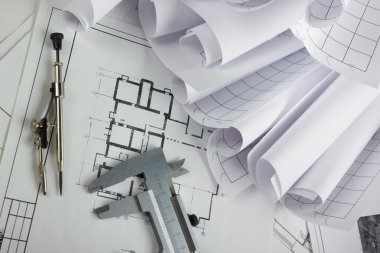 Mimari Proje, taslakları, blueprint rulo planları. Mühendislik araçları en baştan görüntüleyin. Uzay kopyalayın. İnşaat arka plan.
