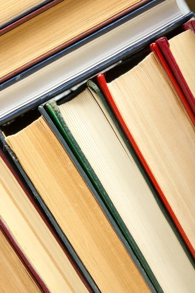 Top view of old used colorful hardback books. Back to school. — Stock Photo, Image