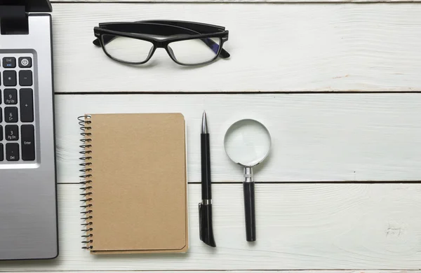 Office desk table with supplies and coffee cup. Top view. Copy space for text — Stock Photo, Image