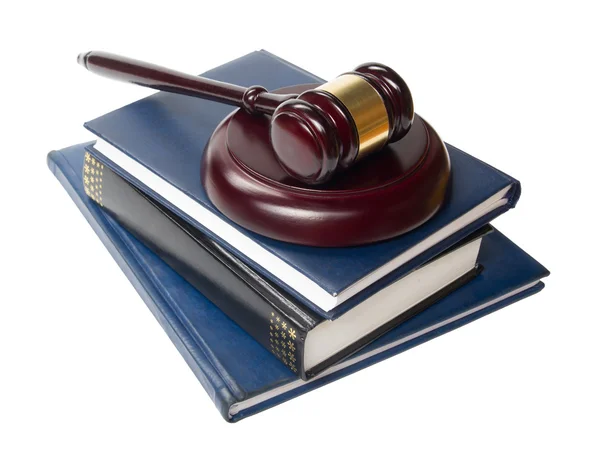 Law book with a wooden judges gavel on table in courtroom — Stock Photo, Image