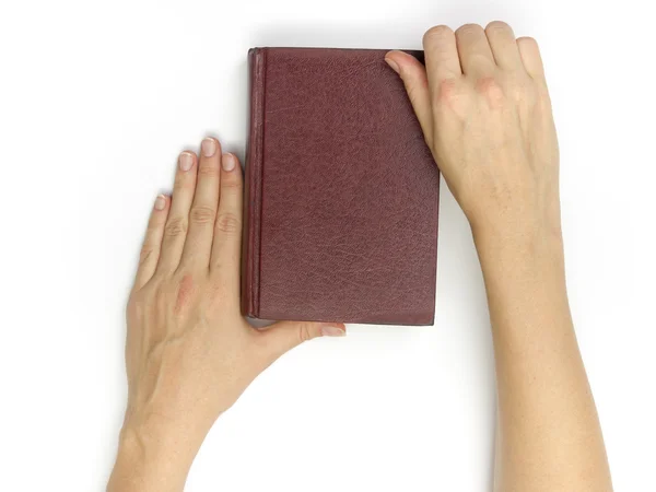 Hands hold blank red hardcover book on white background — Stock Photo, Image