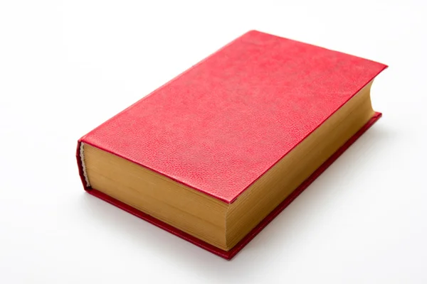 Libro bianco con copertina rigida rossa su sfondo bianco con spazio per la copia — Foto Stock