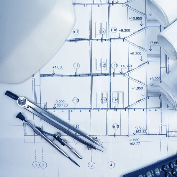 Architectural blueprints, blueprint rolls, compass divider, calc — Stock Photo, Image